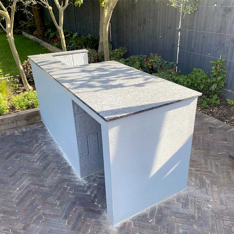 Steel grey granite outdoor countertops created for a BBQ and kitchen in a garden in Sussex by LBS Stone