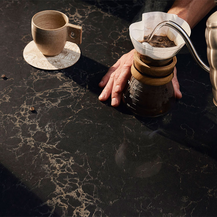 Caesarstone black quartz worktop with subtle gold veining