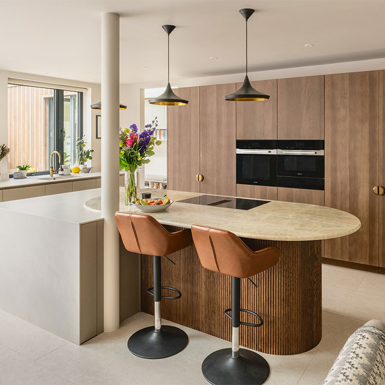 A Design Interiors bespoke kitchen in Brighton with Dekton and quartzite stone kitchen worktops by LBS Stone