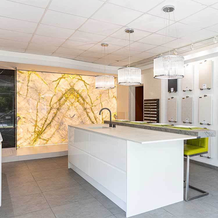 The interior of the LBS Stone showroom in Storrington with displays of stone wall cladding and stone kitchen worktops