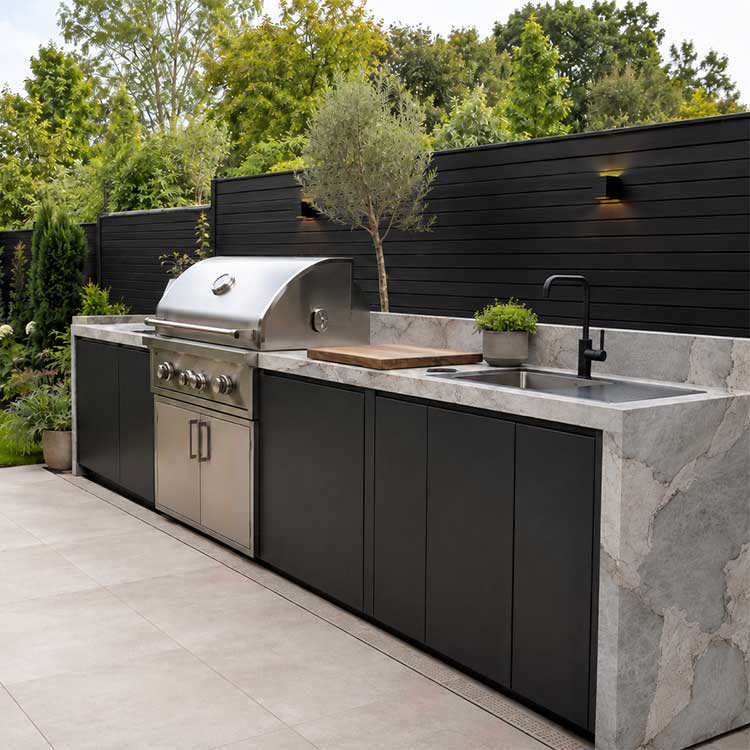 Graphical rendering of an outdoor kitchen and barbecue area with Uniceramica Patagonia porcelain outdoor worktops