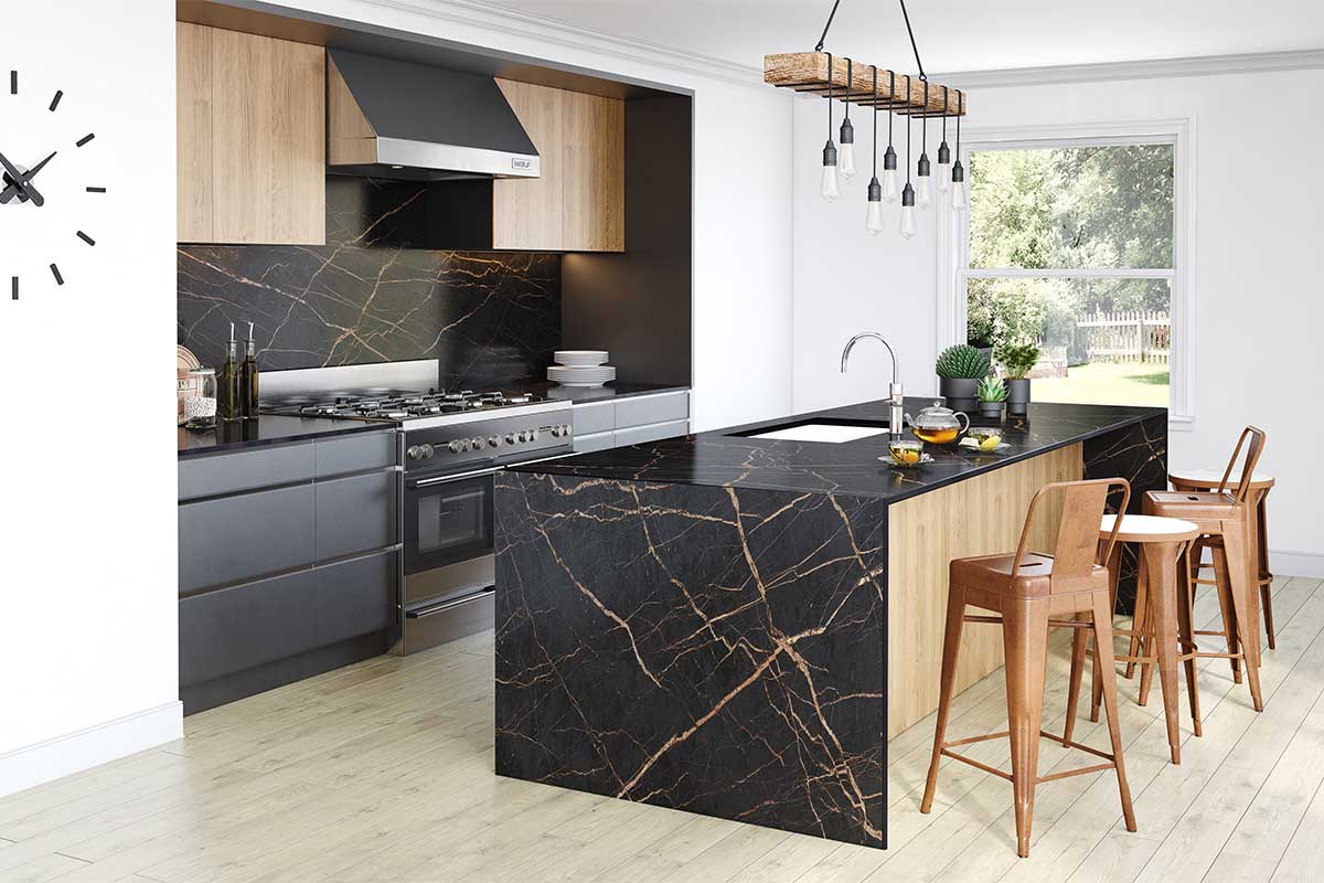 Modern kitchen with large island featuring Dekton Laurent black stone effect sintered stone worktops, splashbacks and cladding