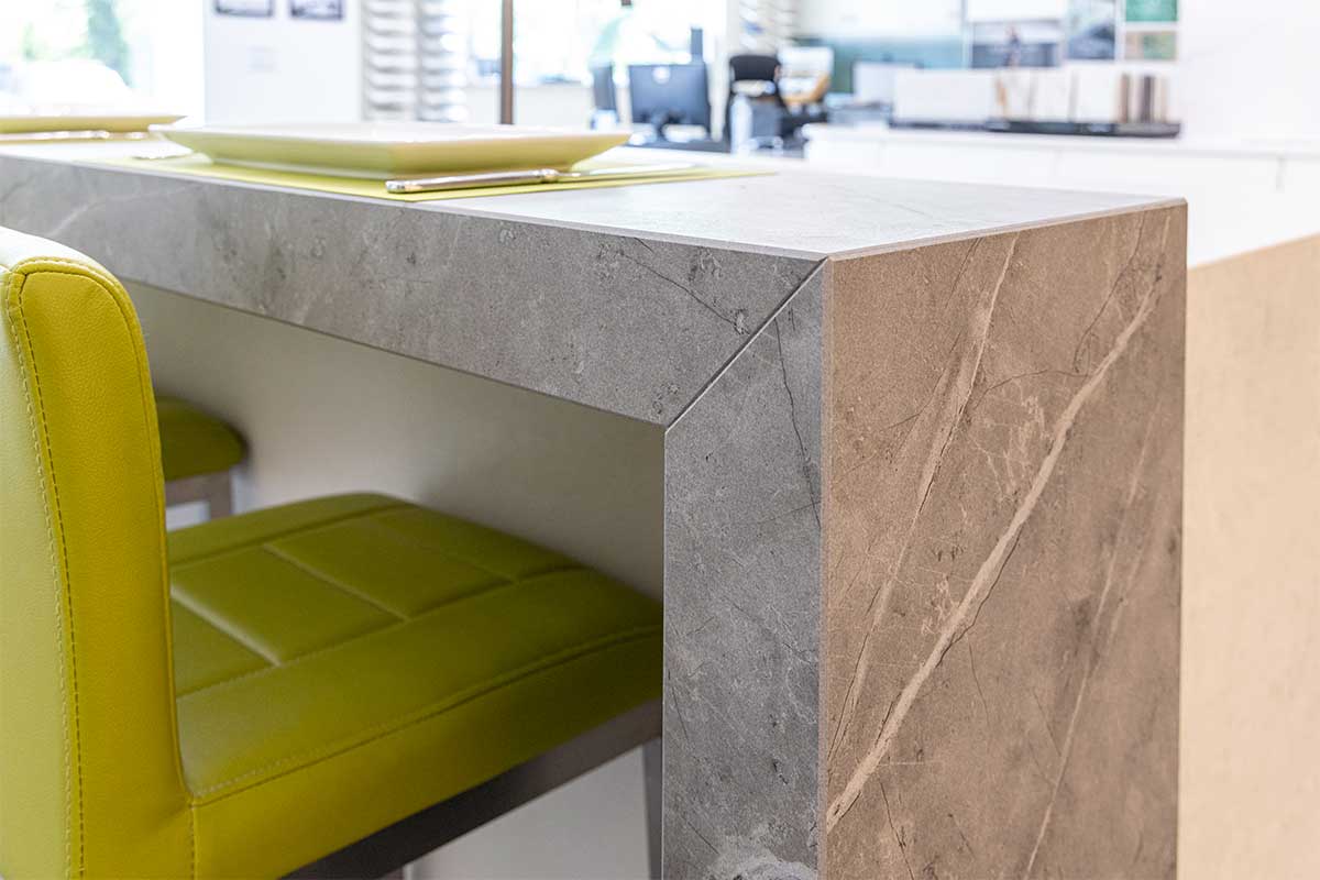 Dekton sintered stone kitchen isalnd and breakfast bar display inside the showroom at LBS Stone in Storrington