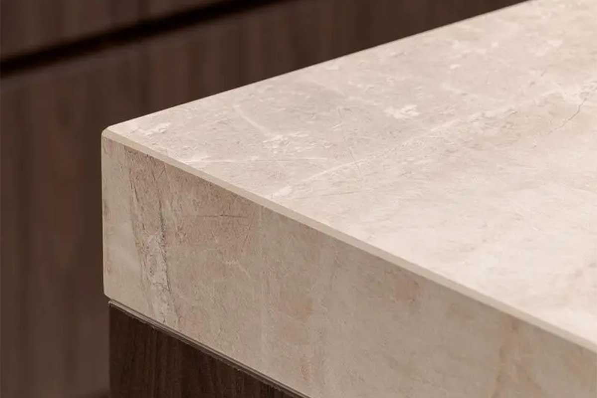 Close detail image of a sand toned Uniceramica Taj Mahal sintered stone kitchen worktop