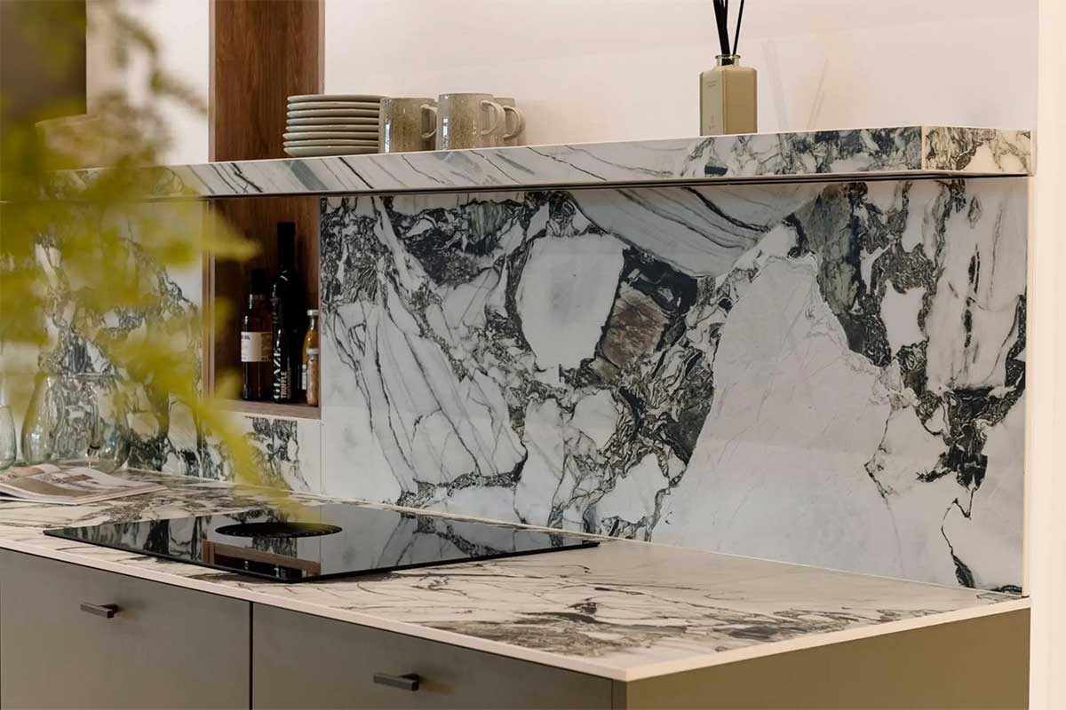 Uniceramica Jade Green marble effect sintered stone worktops with matching splashback and floating shelf
